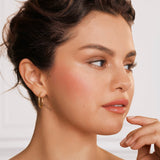 Rare Beauty by Selena Gomez Positive Light Liquid Luminizer Highlight  Color: Outshine